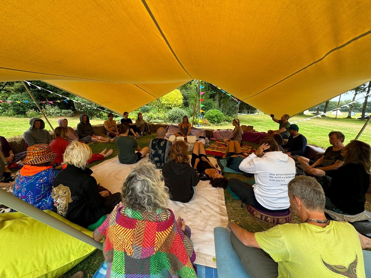 A discussion under the yellow canopy